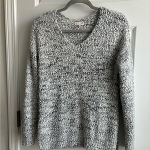So gray sweater